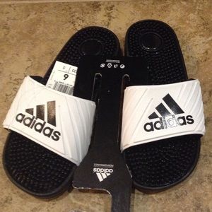 adidas Shoes - NWT adidas white with black logo slides / sandals adidas Shoes - NWT adidas white with black logo slides / sandals